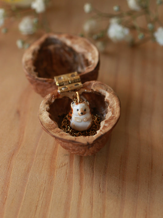 Hedgehog necklace in a walnut box
