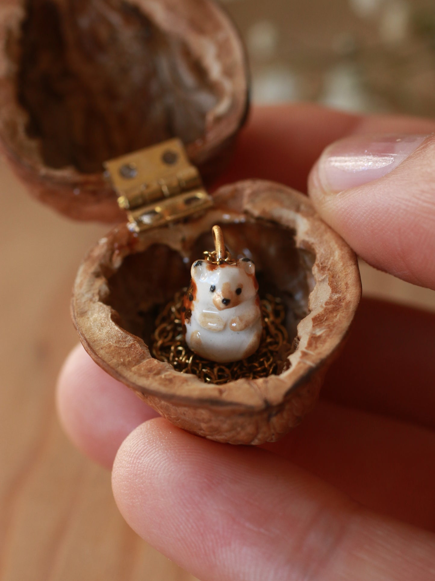 Hedgehog necklace in a walnut box