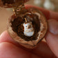 Hedgehog necklace in a walnut box
