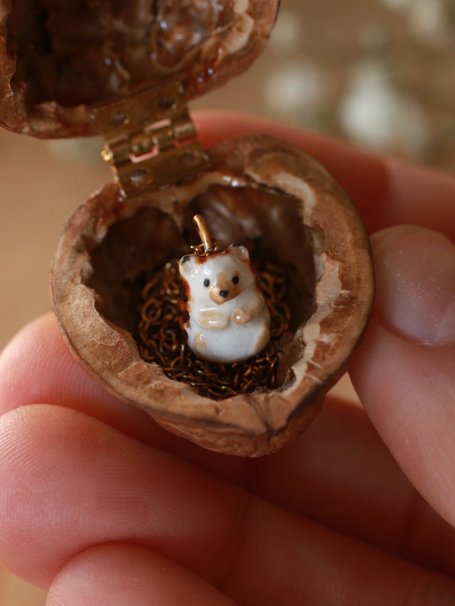 Hedgehog necklace in a walnut box