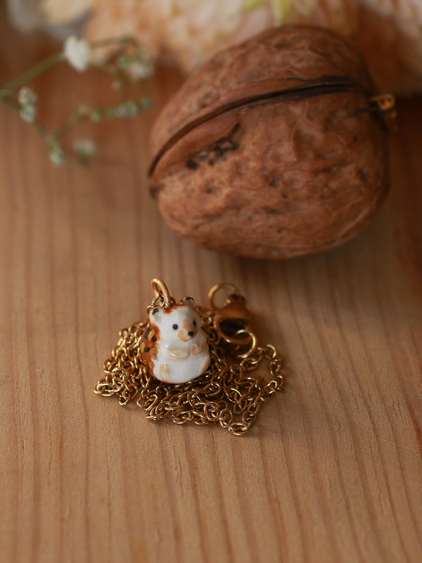 Hedgehog necklace in a walnut box