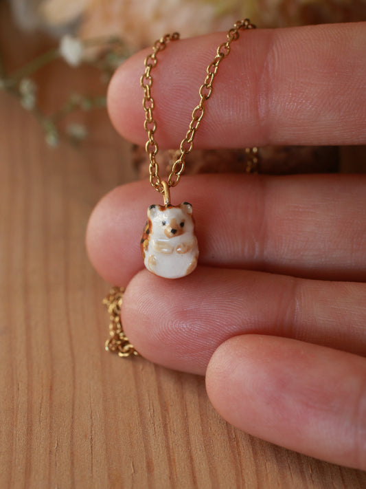 Hedgehog necklace in a walnut box