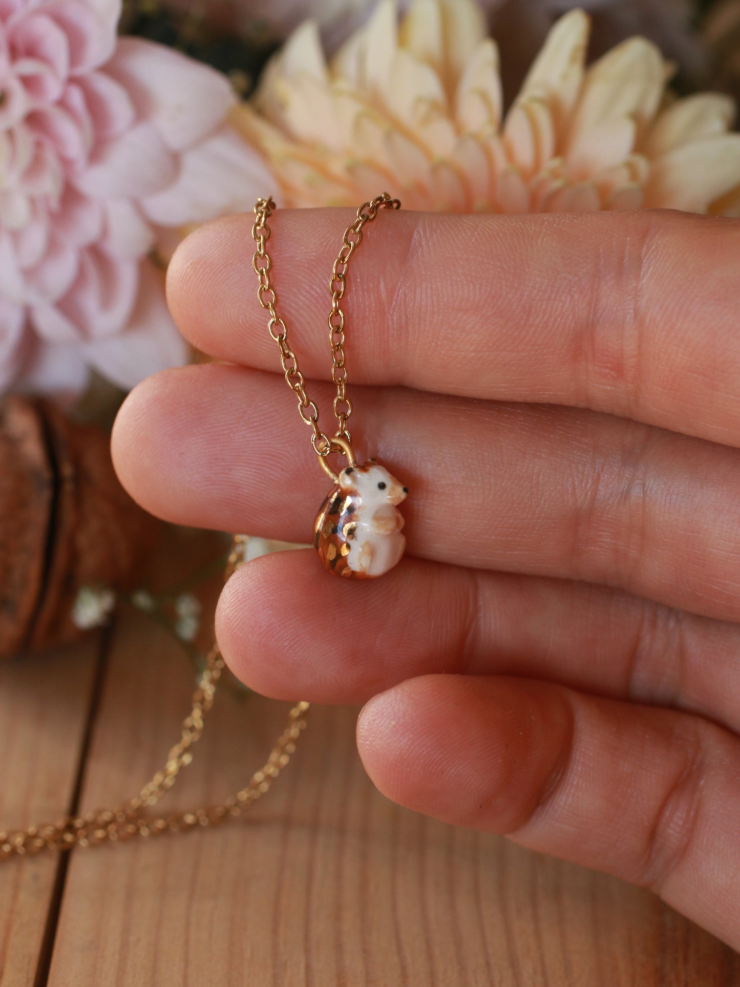 Hedgehog necklace in a walnut box