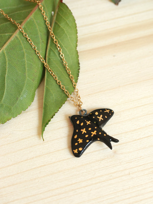 Starry swallow necklace - 22k gold details