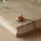 Hedgehog necklace with a tiny mushroom