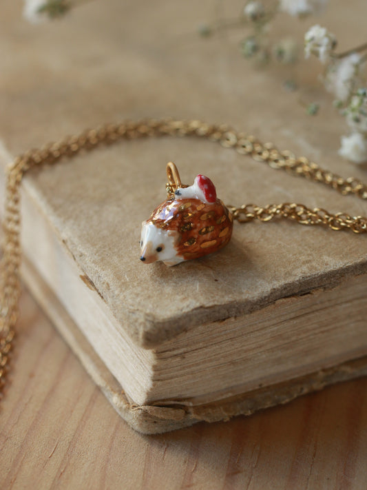 Hedgehog necklace with a tiny mushroom