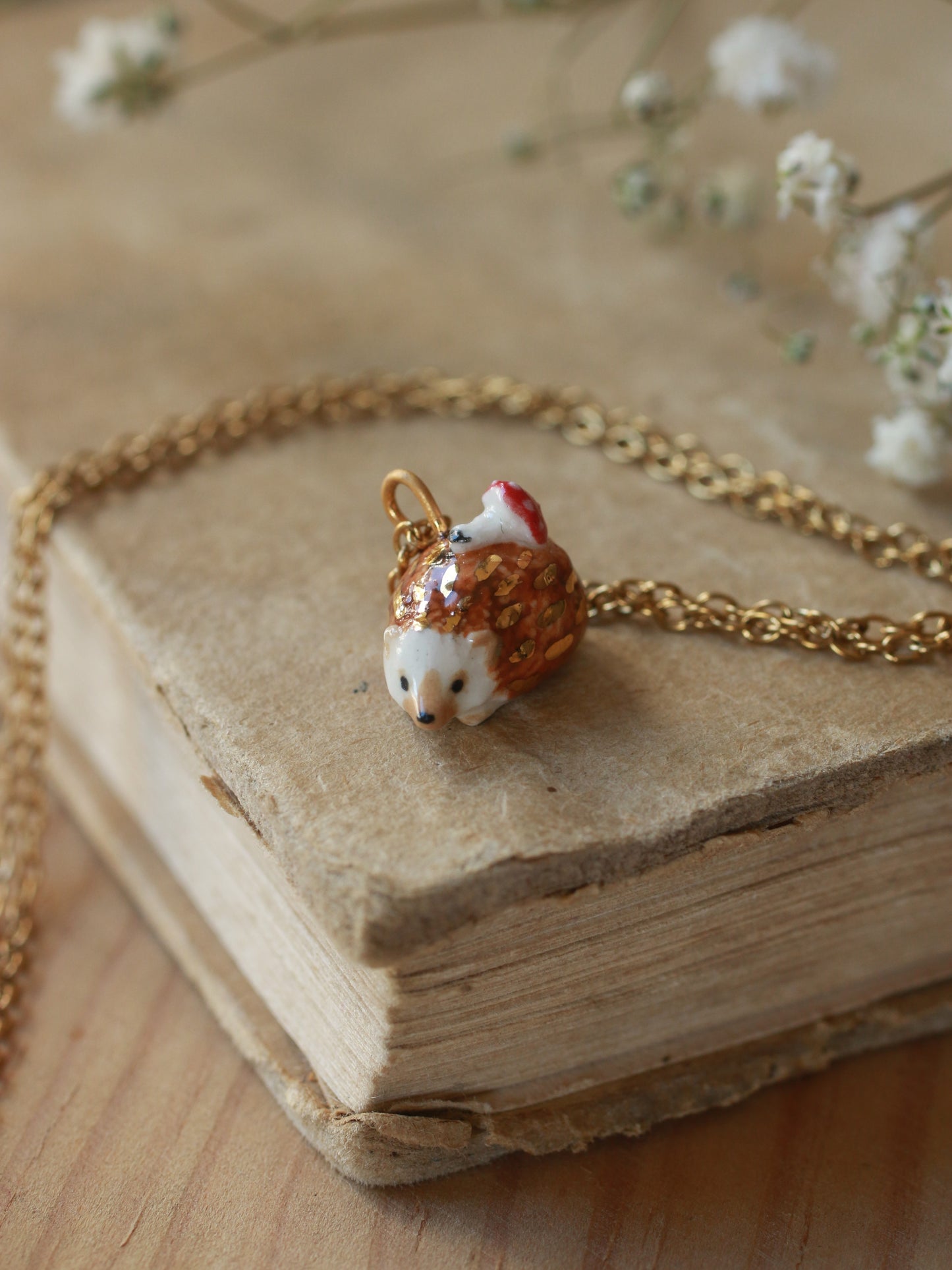 Hedgehog necklace with a tiny mushroom