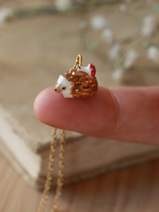 Hedgehog necklace with a tiny mushroom