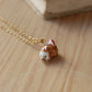 Hedgehog necklace with a tiny mushroom