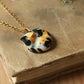 Sleeping calico cat necklace