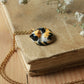 Sleeping calico cat necklace