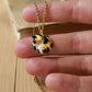 Sleeping calico cat necklace