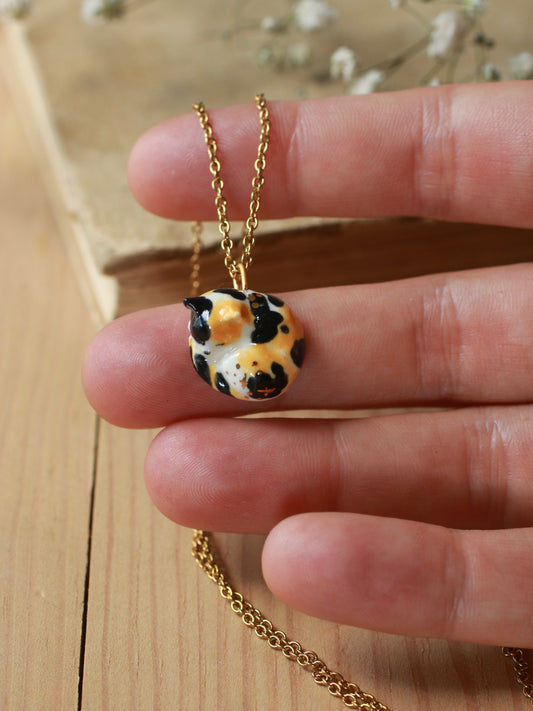 Sleeping calico cat necklace