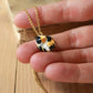 Sleeping calico cat necklace
