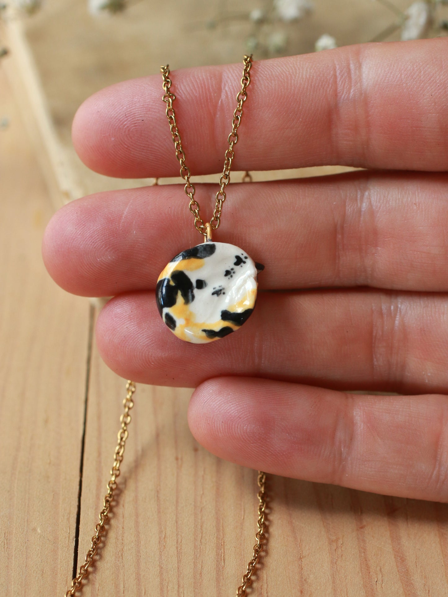 Sleeping calico cat necklace