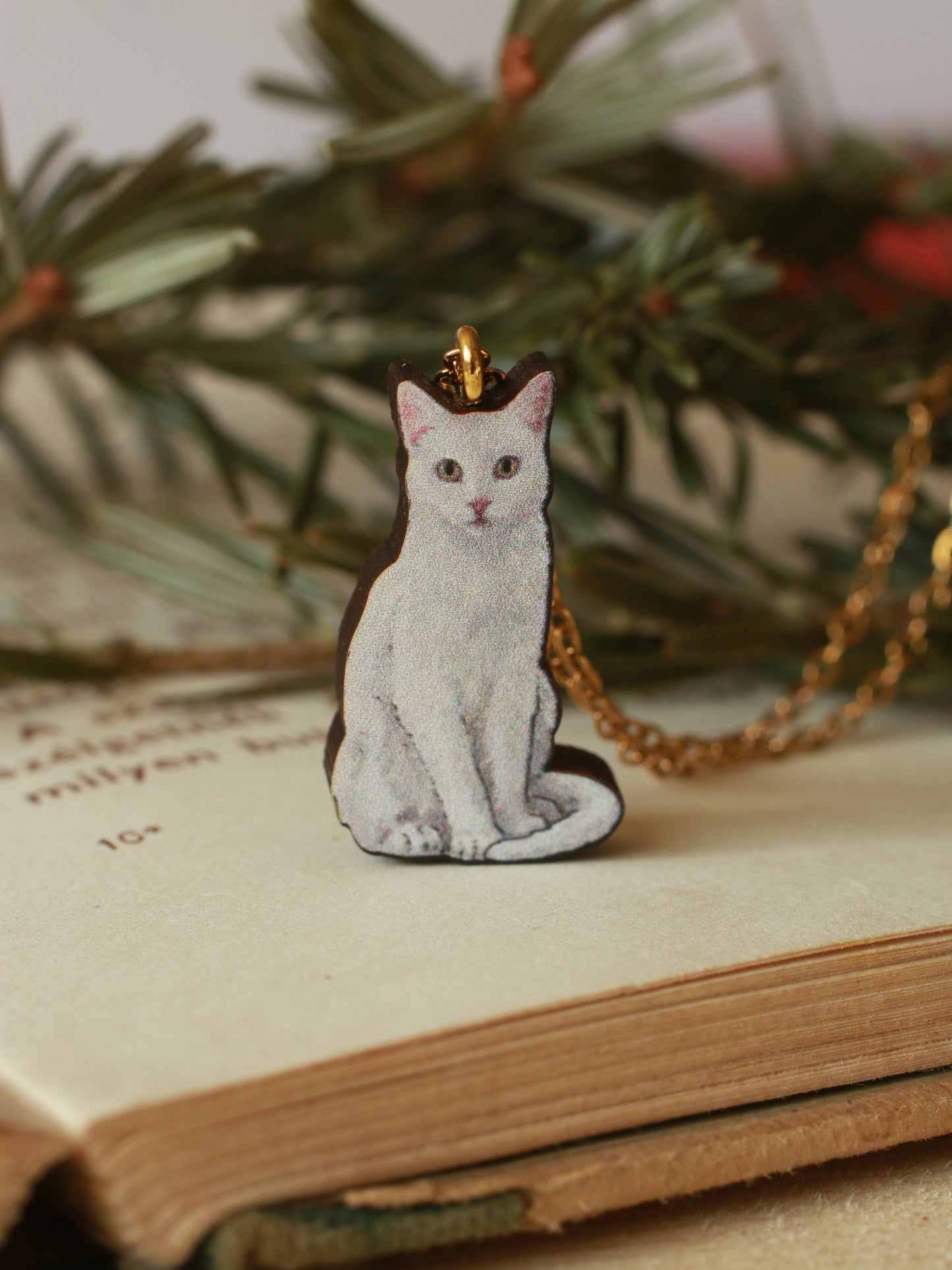 White cat necklace