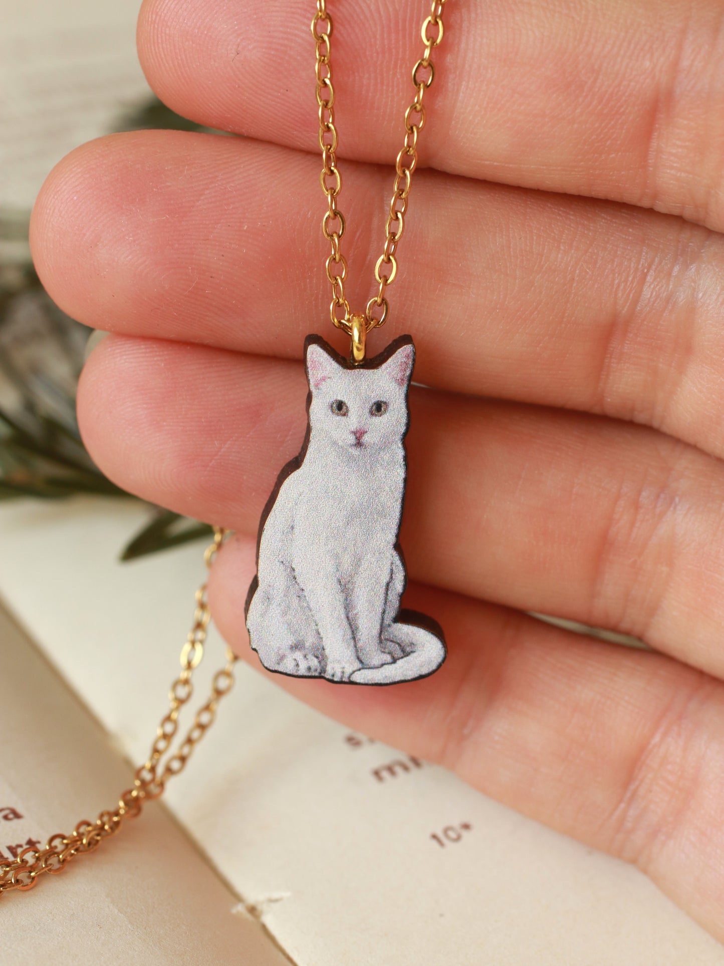 White cat necklace