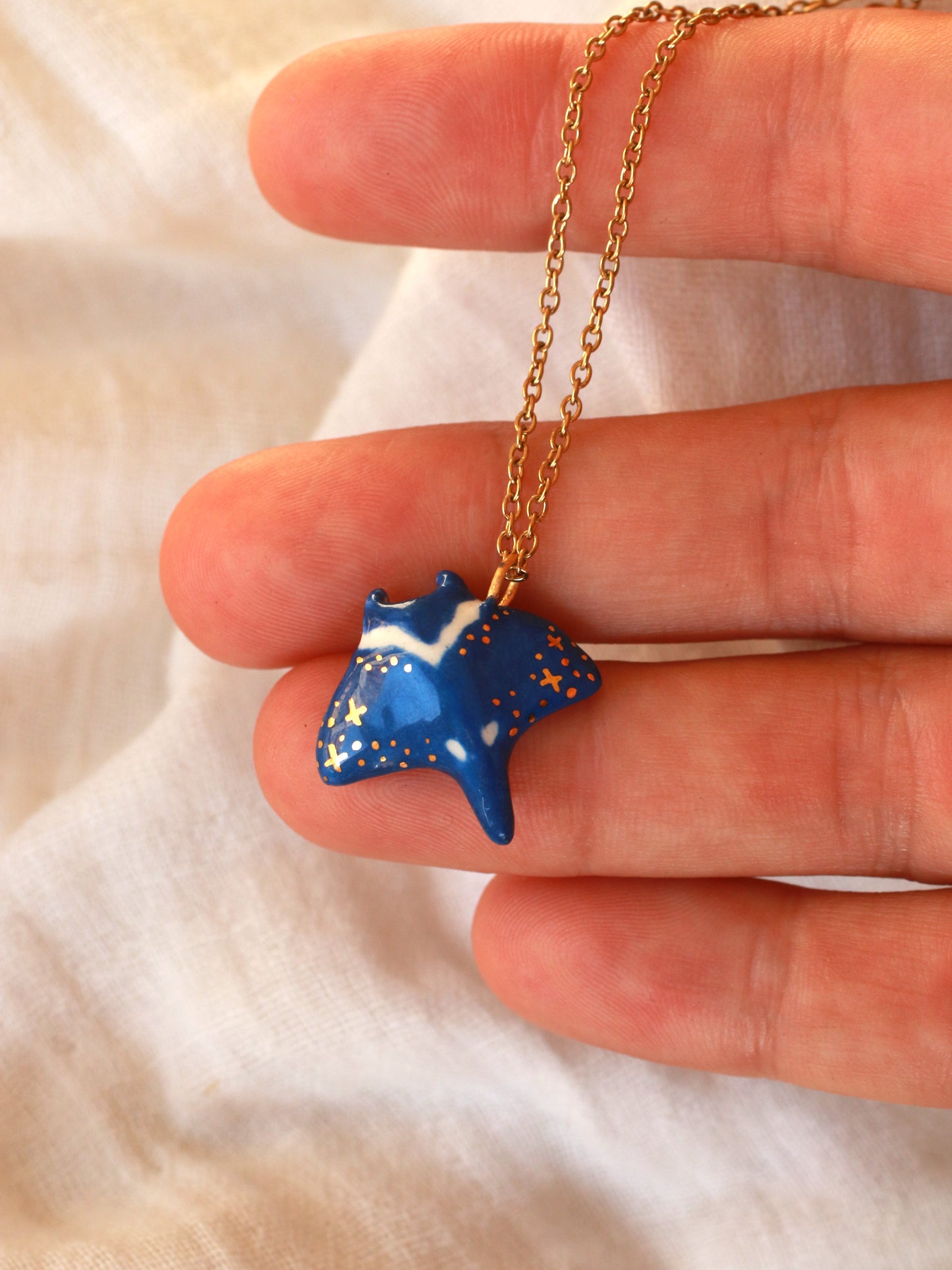 Dark blue Manta ray necklace