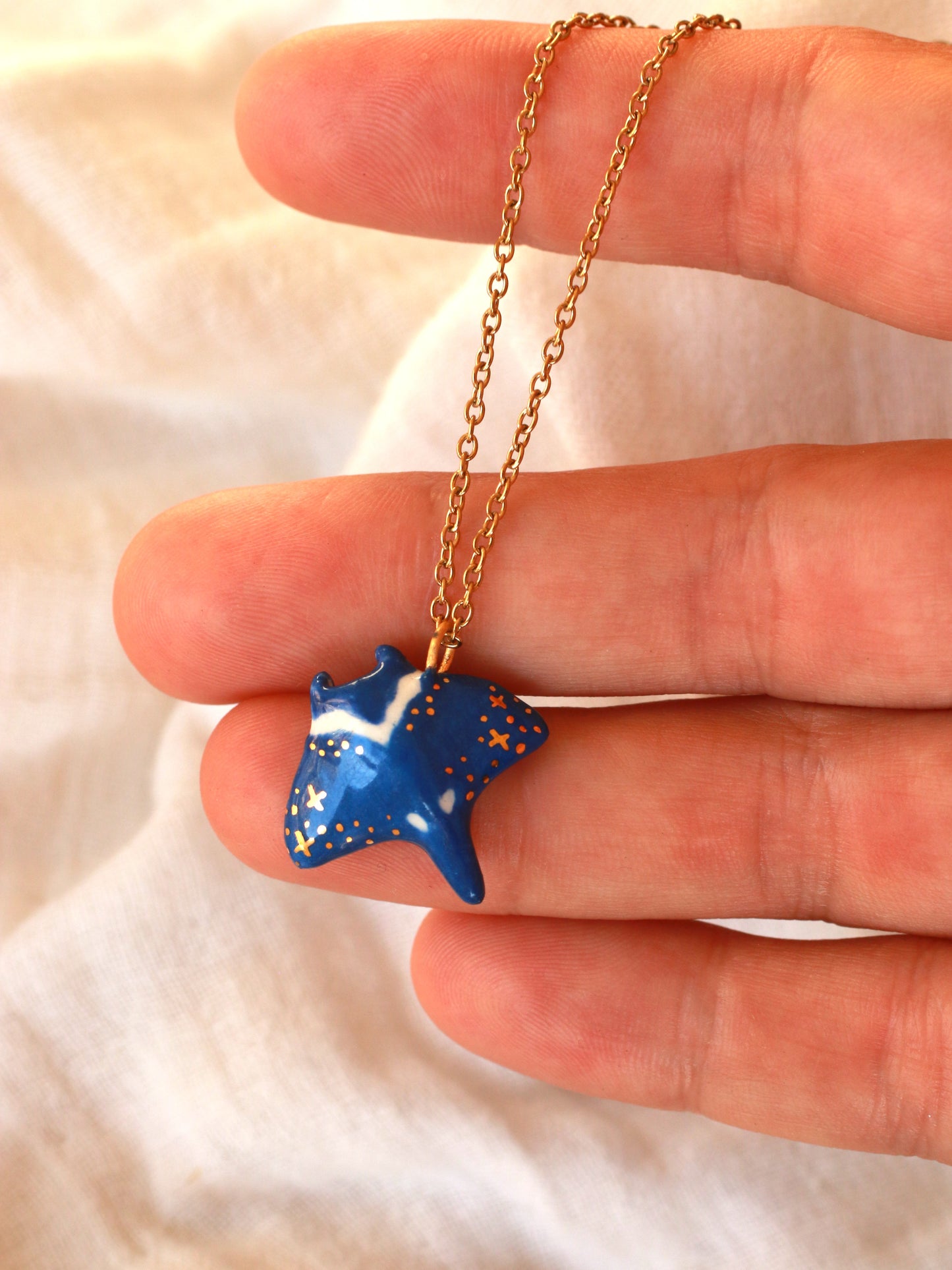 Dark blue Manta ray necklace