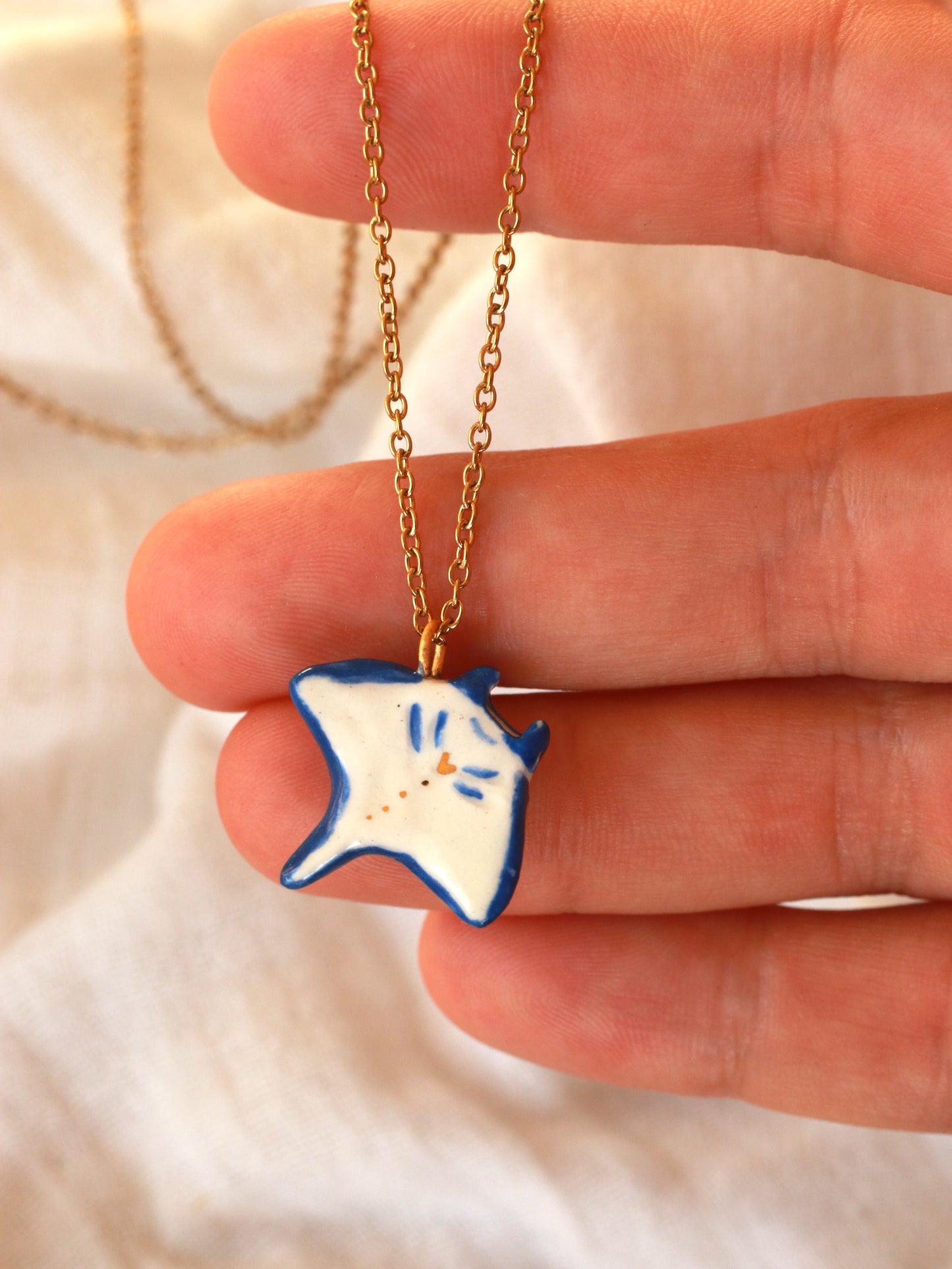 Dark blue Manta ray necklace