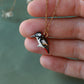 Woodpecker necklace