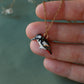 Woodpecker necklace
