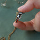 Woodpecker necklace