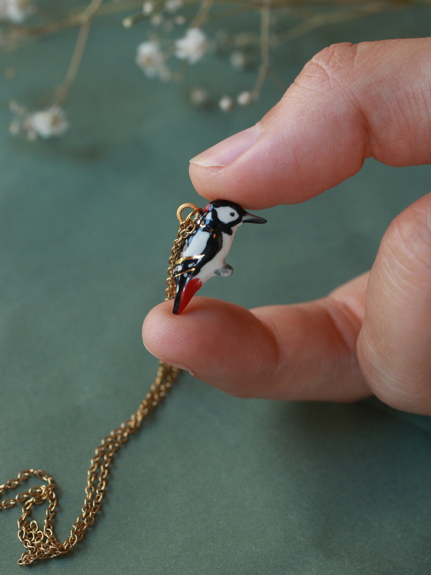 Woodpecker necklace