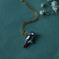 Woodpecker necklace