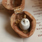 Baby barn owl necklace in a nutshell box