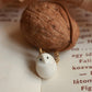 Baby barn owl necklace in a nutshell box