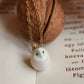 Baby barn owl necklace in a nutshell box