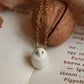 Baby barn owl necklace in a nutshell box