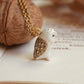 Barn owl necklace in a nutshell box - gold details