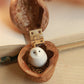 Baby barn owl necklace in a nutshell box