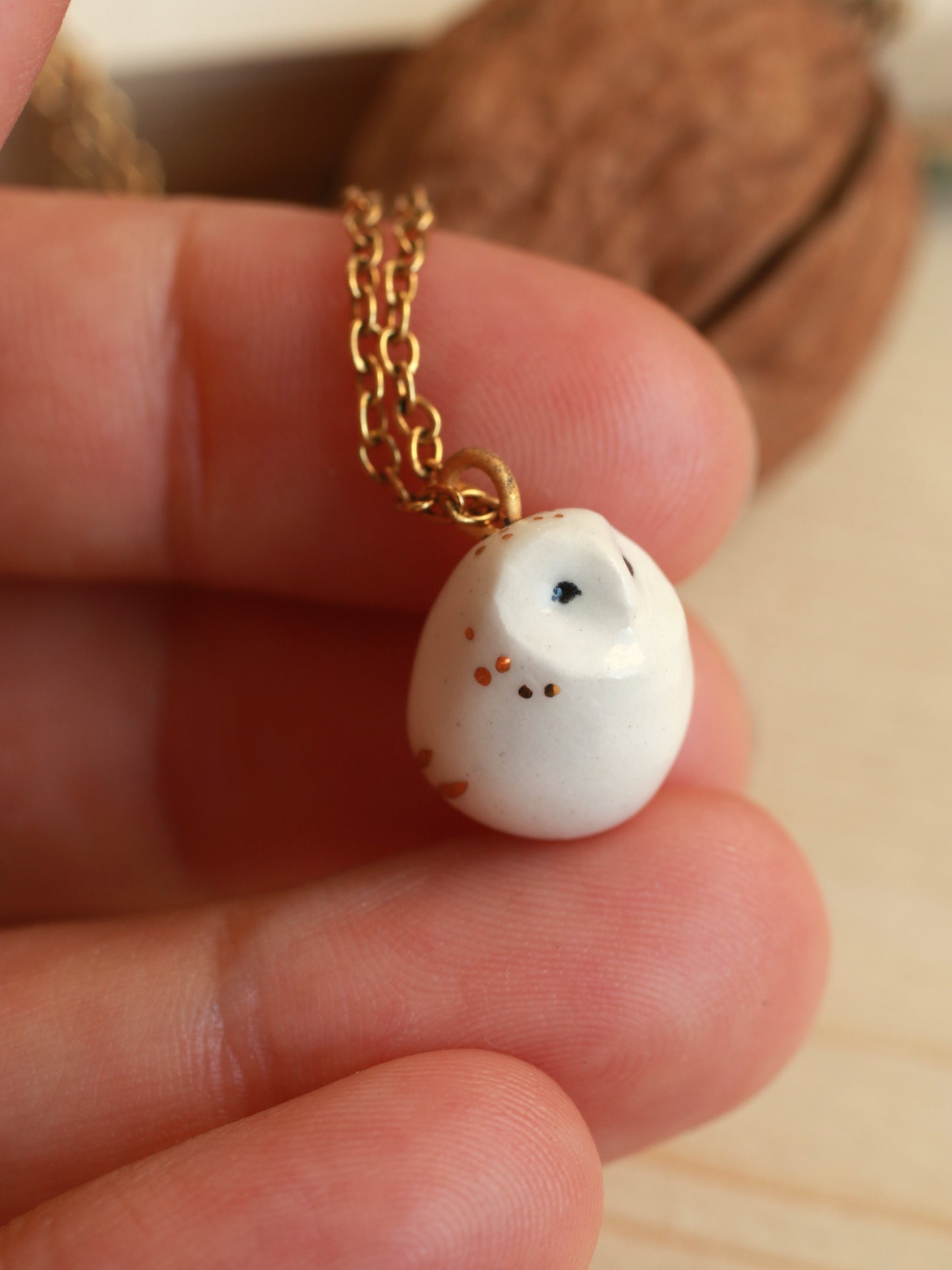 Baby barn owl necklace in a nutshell box