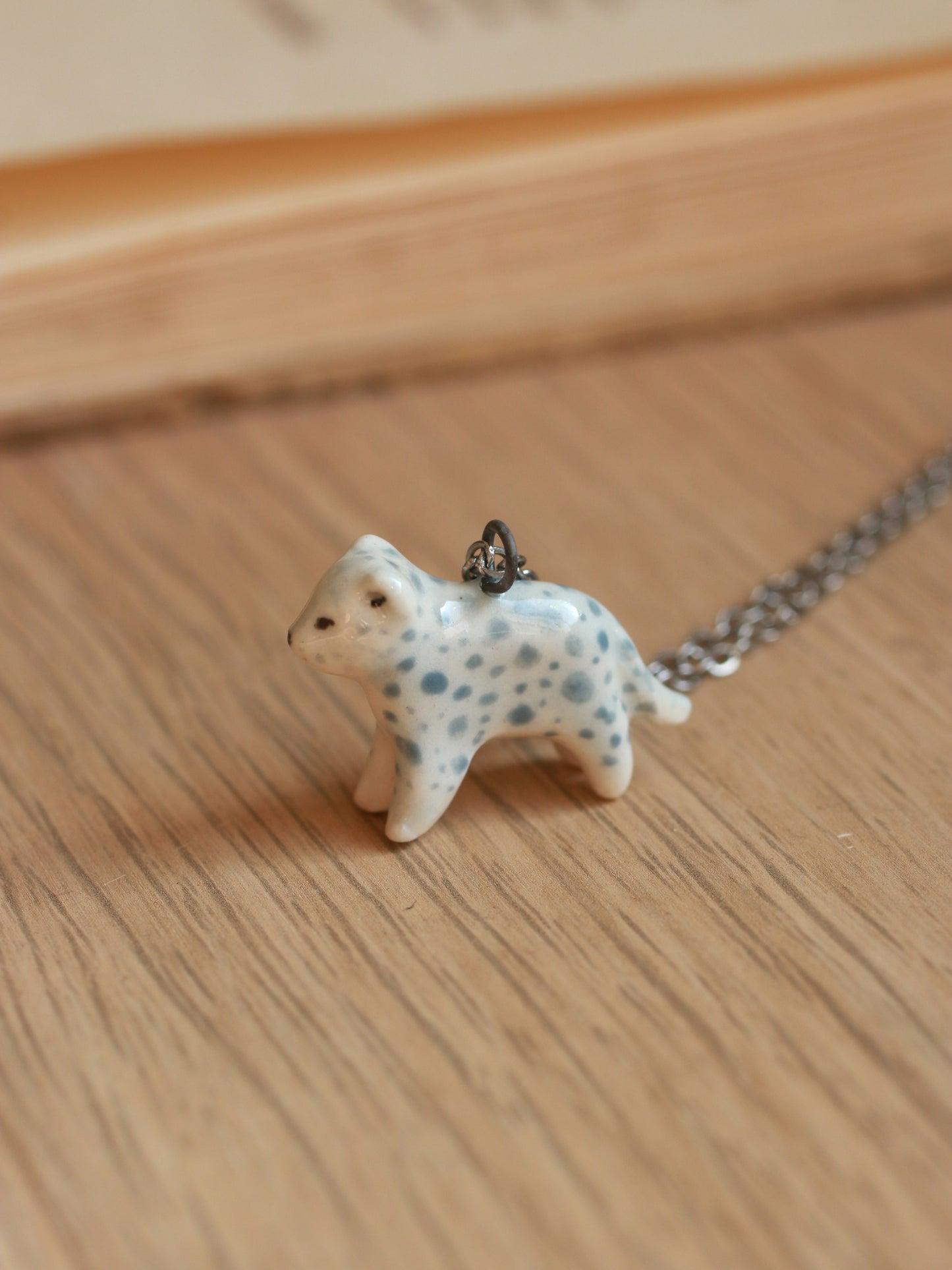 Snow leopard necklace