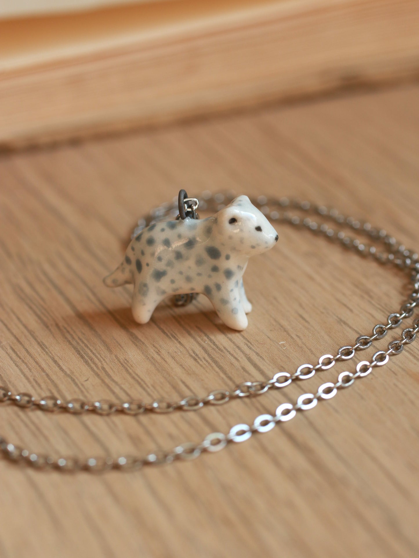 Snow leopard necklace