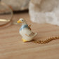 Duck with a blue scarf - ceramic necklace