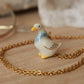 Duck with a blue scarf - ceramic necklace