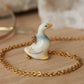 Duck with a blue scarf - ceramic necklace