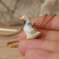Duck with a blue scarf - ceramic necklace