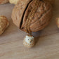 Hedgehog necklace in a walnut box