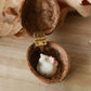 Sleeping cat necklace in a walnut box