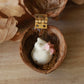 Sleeping cat necklace in a walnut box