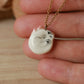 Sleeping cat necklace in a walnut box