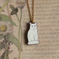 White cat necklace