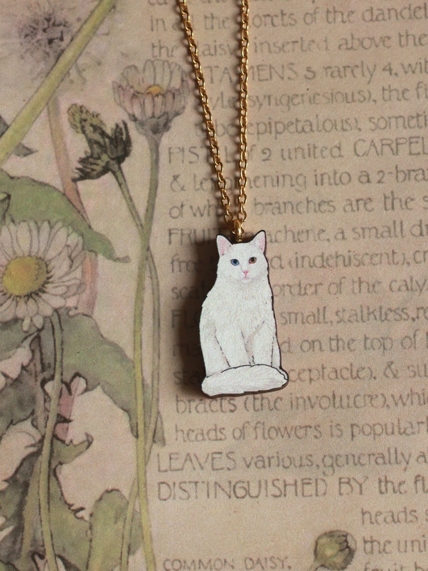 White cat necklace