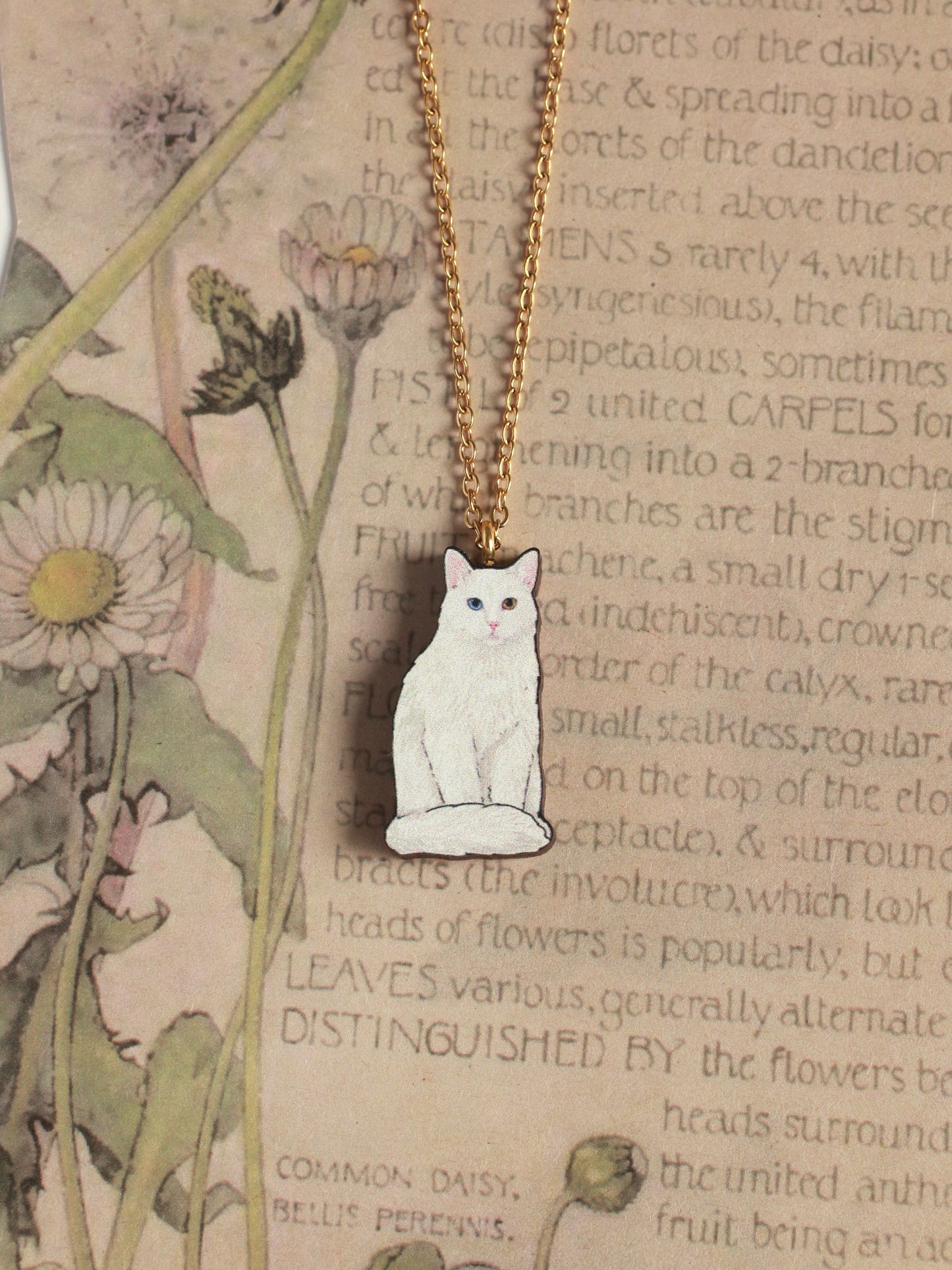 White cat necklace