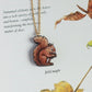 Wooden squirrel necklace